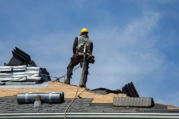 Professional Roofing technician working in Huffman, TX